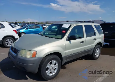 2004 Ford Escape Xlt z USA, uszkodzony, nr VIN 1FMYU93164KB42469
